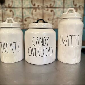 Rae Dunn Halloween Canisters. Treats has a tiny chip on the bottom.